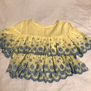 yellow crop too with blue flowers